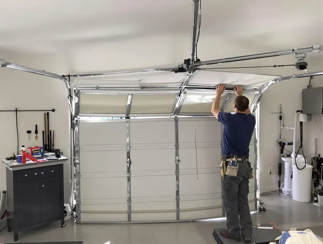 Gainesville Garage Door Repair specialist performing precise section replacement on Gainesville garage door
